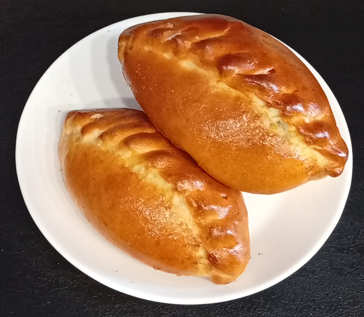 Pirukas rohelise sibula ja munaga